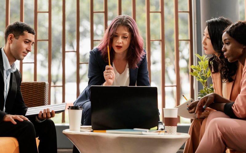 medium-shot-woman-leading-meeting-indoors_23-2148868426